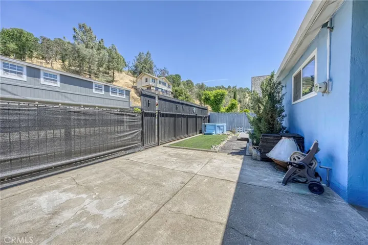 Private front yard with pull through gate