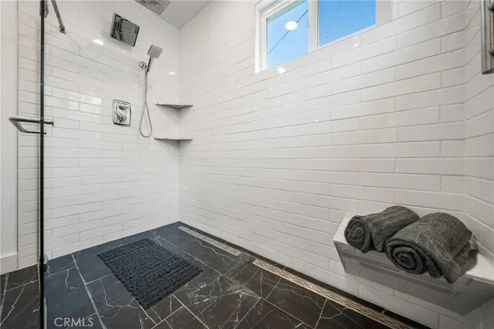 Curbless custom tile shower & radiant flooring