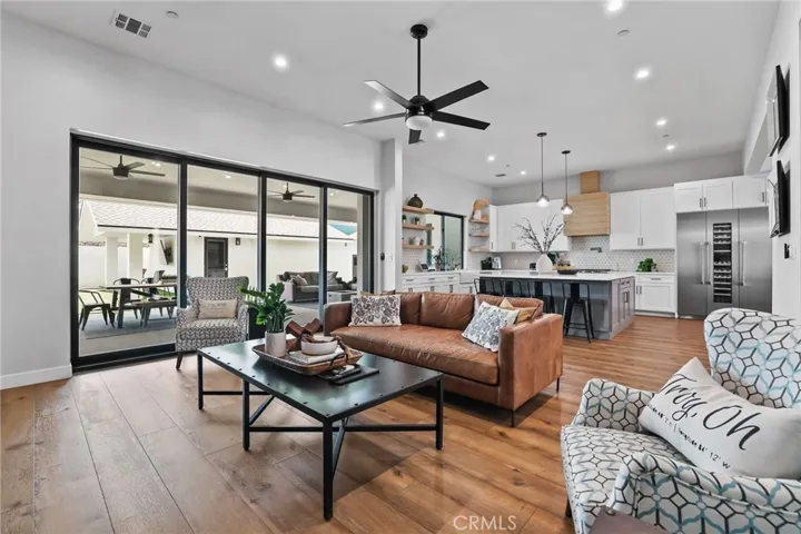 Indoor-Outdoor Living – Oversized sliders open to the backyard, creating a seamless transition from the great room to the outdoors.