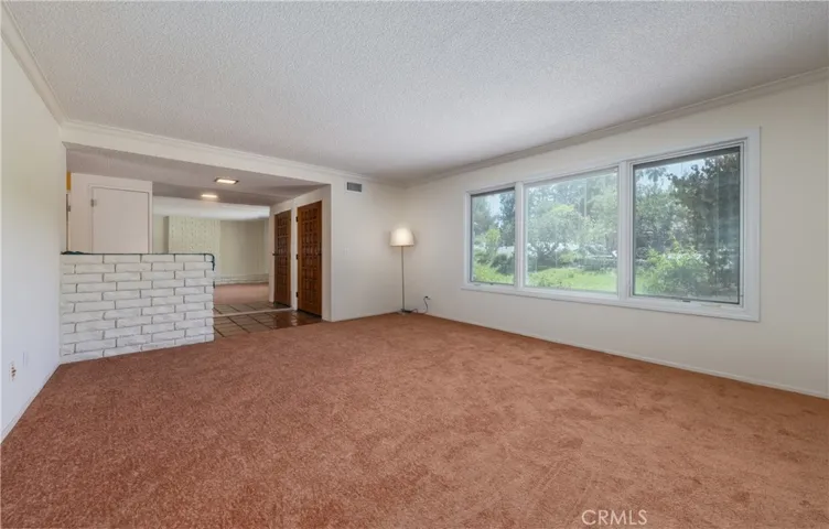 Living room looking to front door