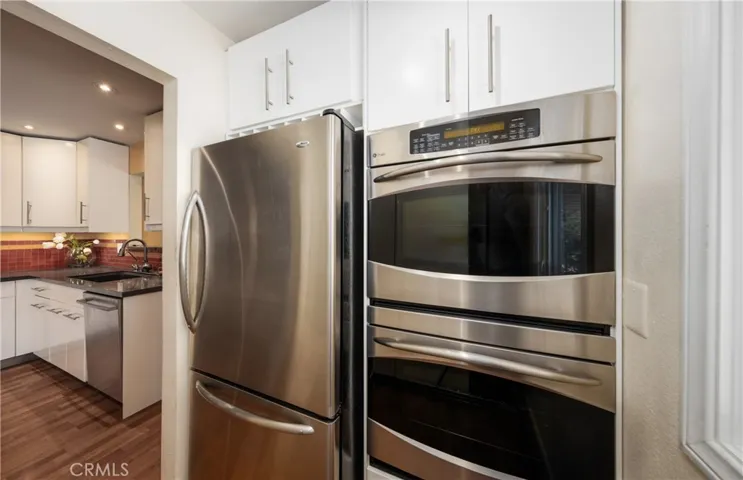 refrigerator remains; double oven (top is convection oven)