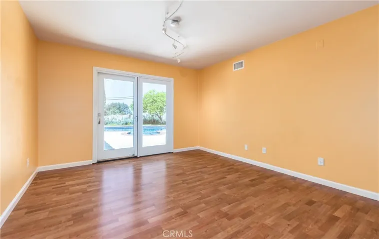 4th bedroom opens to rear yard; closet has been removed