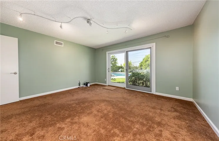 3rd bedroom opens to rear yard