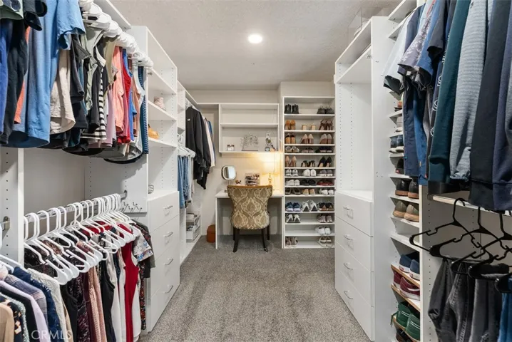 Very large custom walk in closet in the primary bedroom.