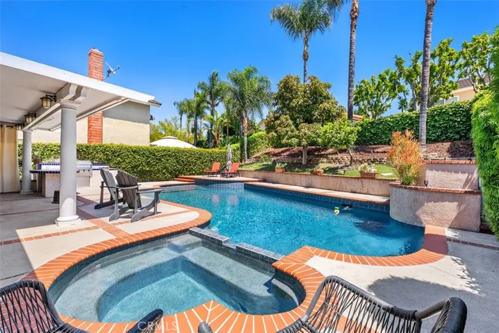 Wow! Enjoy this resort like backyard with recent resurfaced pebble tech pool & spa!