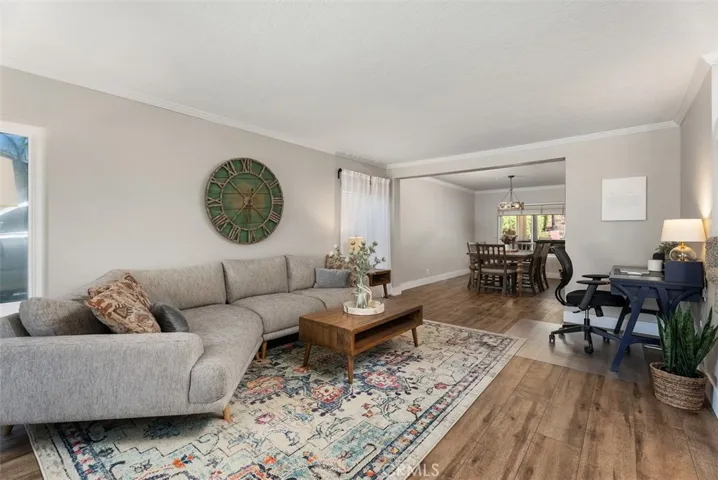 Living room with new luxury laminate flooring.