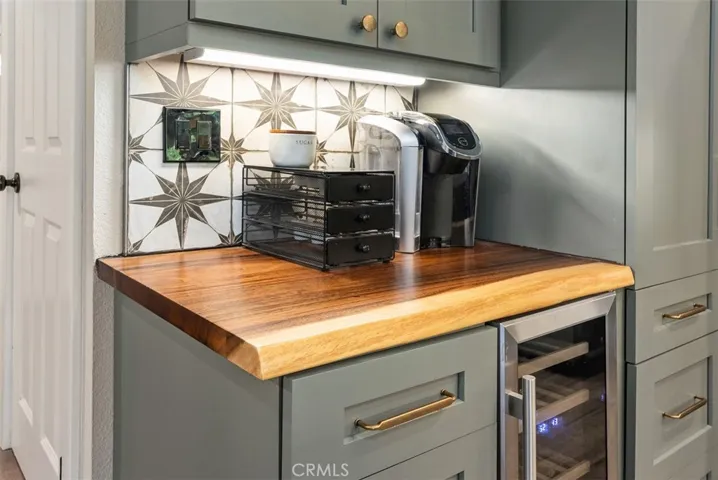 Coffee bar & wine fridge.