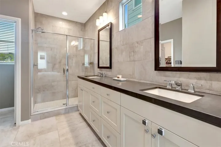 Large primary bathroom with walk-in closet
