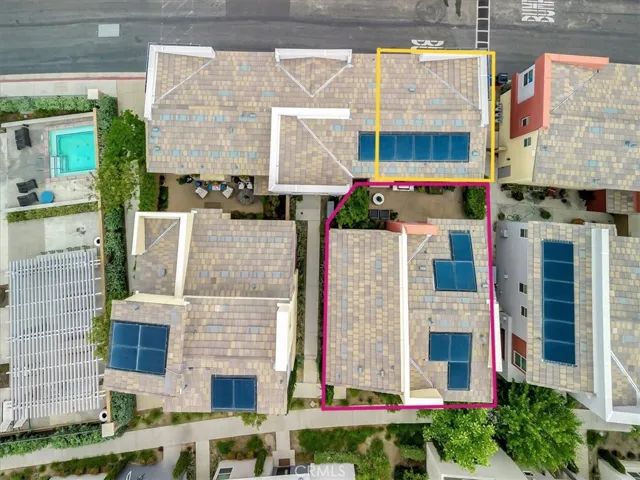 Detached garage (outlined in yellow) is accessible from patio.