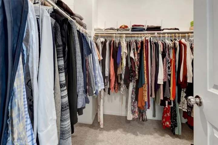 Primary suite walk-in closet.
