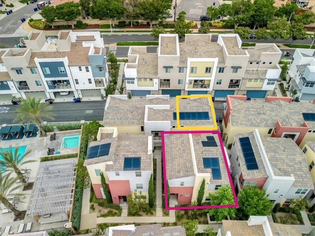 Detached garage (outlined in yellow) is accessible from patio.