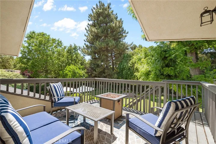 Primary balcony that leads to backyard