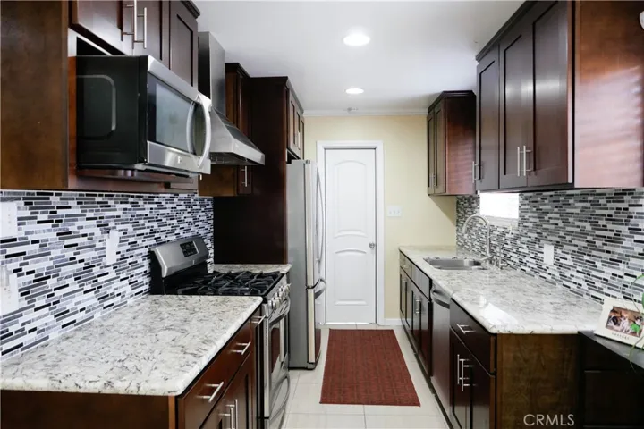 renovated kitchen with direct access to 2-car garage