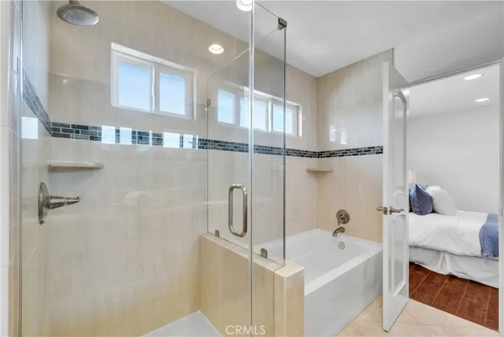 Jack & Jill Bathroom has Tub and Separate Shower