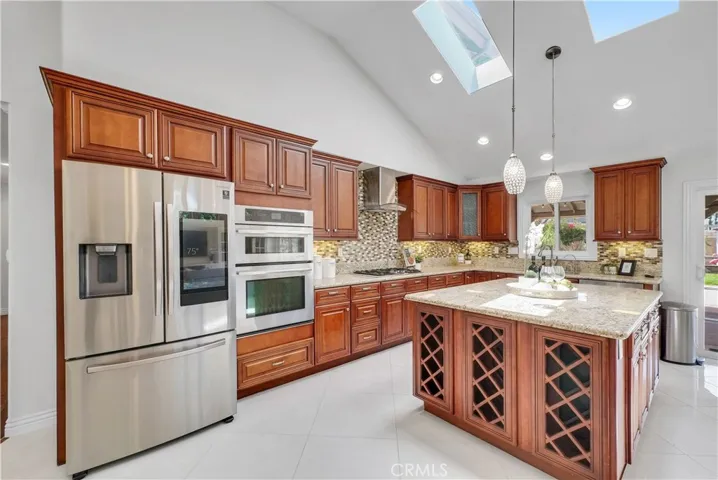 Center Island has Built-In Cabinetry and Wine Storage