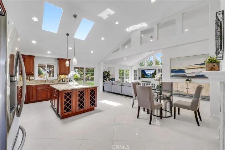 Unbelievable Chef's Dream Kitchen that's Open to the Family Room with Fireplace and Entertainment Center and a Breakfast Room - Cathedral Ceiling, skylights, Recessed Lighting


