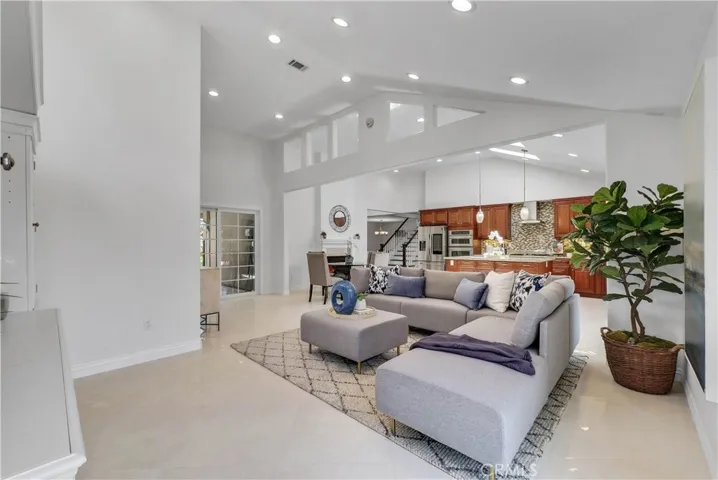 Great-Room Style Chef's Kitchen, Breakfast Room, and Family Room with Soaring Ceiling