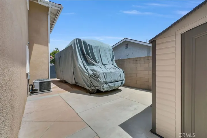 Double Gated RV Side Yard Concrete Parking Pad Plus Shed