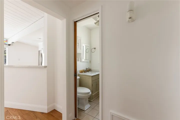 Hall leading to living area and bathroom