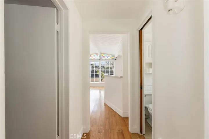 Hallway with entrance to either bedroom