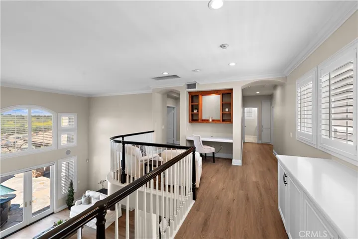Landing opens to downstairs.
