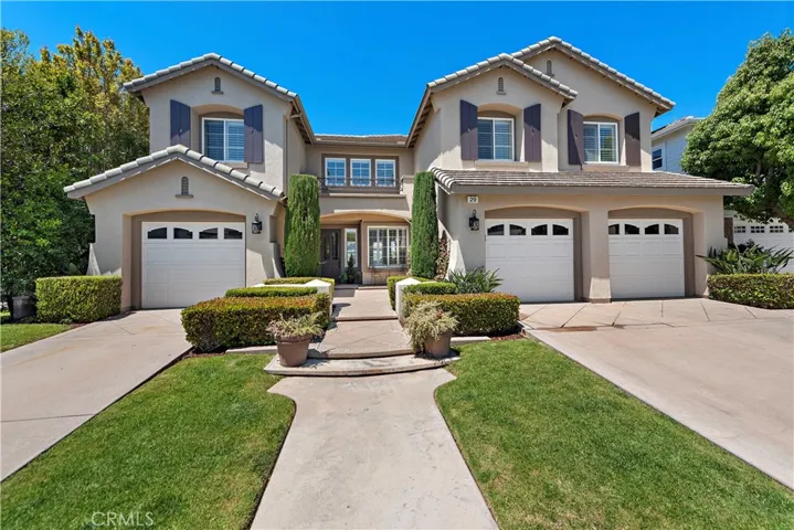 Beautifully Landscaped 3 car garage.