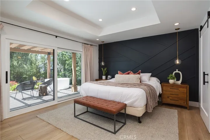 primary bedroom that opens to the beautiful deck
