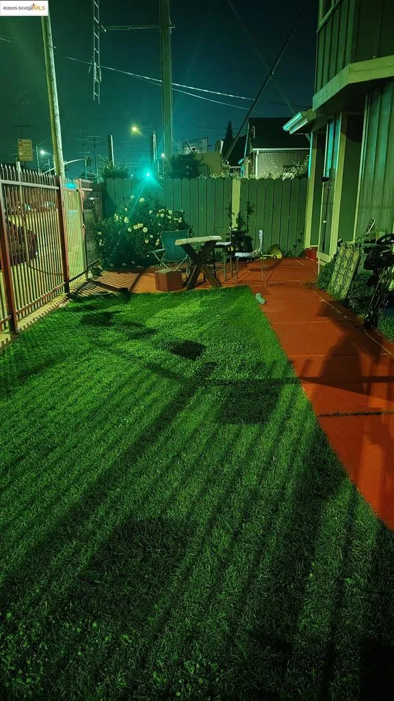 Yard at twilight with a patio area