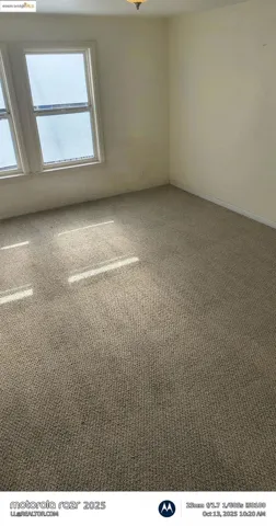 Empty room featuring carpet