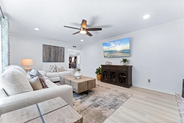 Formal living room sits off the foyer and is private and relaxing!