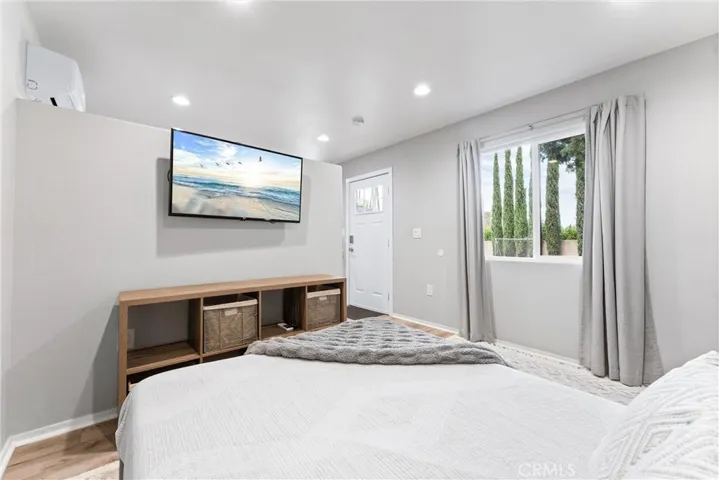 ADU bedroom has a wall separating it from the living space!