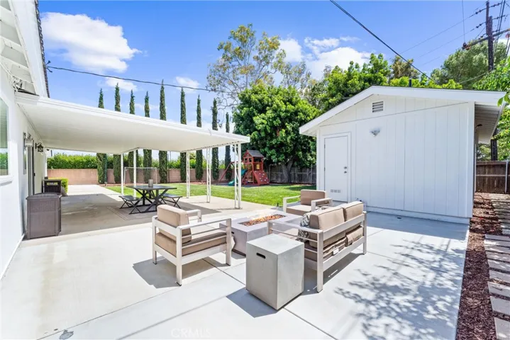 Views of the backyard with ADU to the right and home to the left!  The large covered patio is a perfect spot for outdoor dining and relaxing!