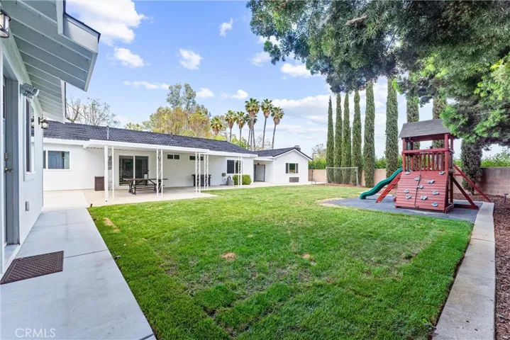 Views of the backyard from the ADU.  The yard is spacious with plenty of yard space, outdoor living space, and privacy!