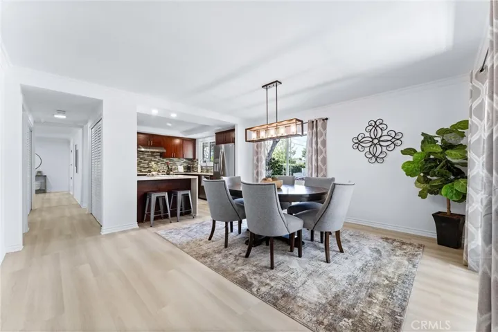 Dining room and kitchen are spacious with tons of natural light flowing through the large windows!
