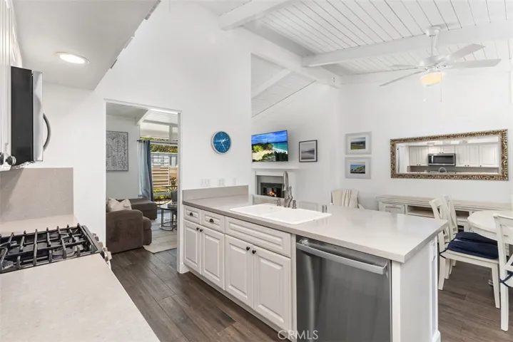 kitchen open to living and dining areas