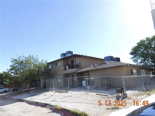 Back of the building looking SW from the NE corner of the property