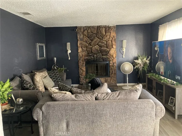 Unit A - Living room with fire place