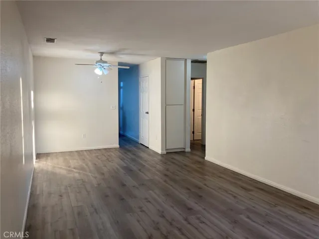 Unit B - Living room looking from front through to kitchen & hall to bedrooms