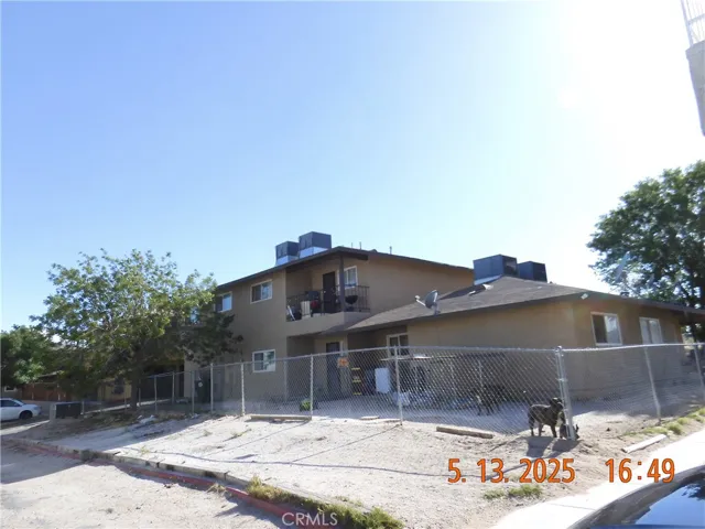 Back of the building looking SW from the NE corner of the property