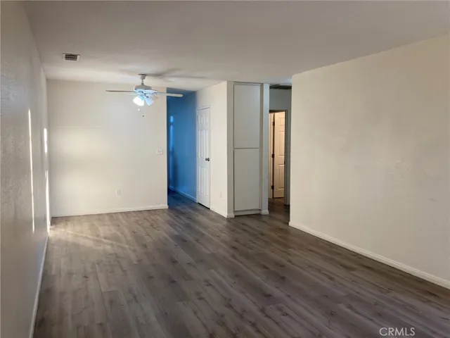 Unit B - Living room looking from front through to kitchen & hall to bedrooms