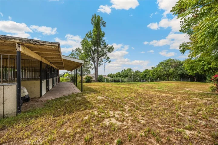 Stables & riding ring on upper paddock
