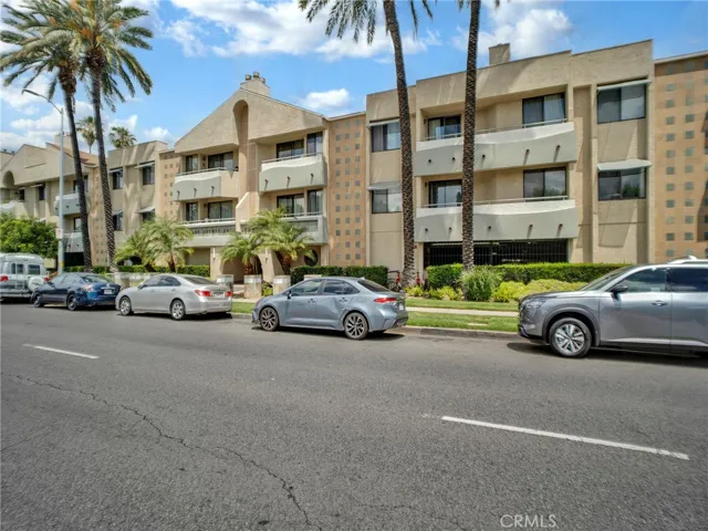 Well-maintained building with a manicured, landscaping and palm trees offering great curb appeal.