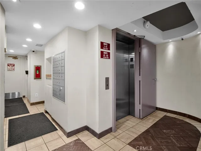 Convenient lobby, amenities, including elevator, access mailboxes, and a pathway to the pool and courtyard, plus nearby pet exit​​‌​​​​‌​​‌‌​​‌​​​‌‌​​​‌​​‌‌​​‌‌​​‌‌​​​​ access.