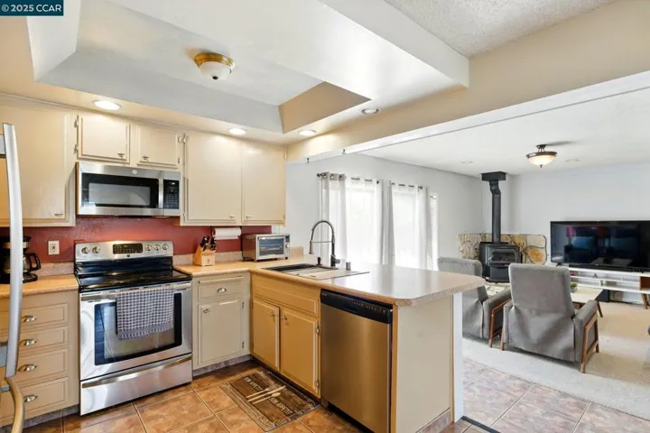 Modern Stainless Steel Sink with Wood Cutting Board Feature