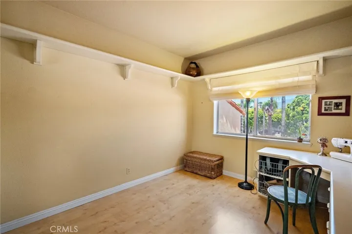 Third bedroom with built-in desk/study area.