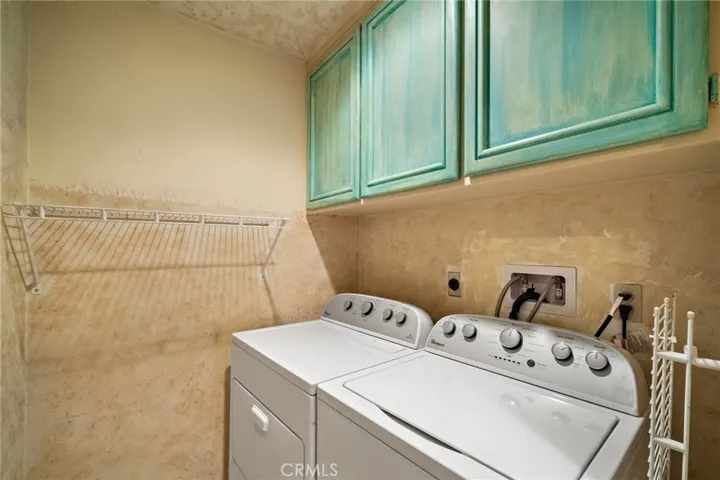 Inside laundry room.