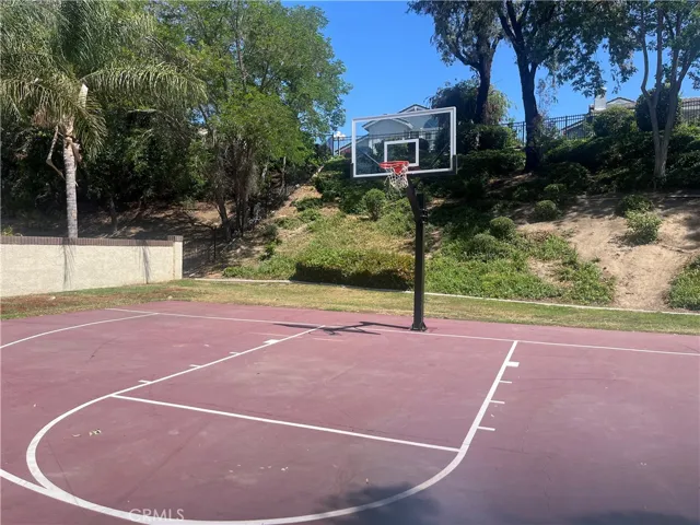 Just below property is this nice park with basketball quart