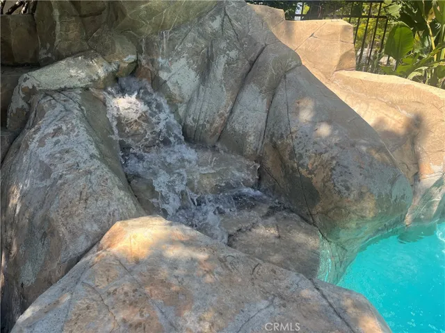 Pool waterfall and slide