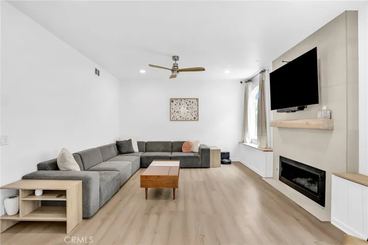 Family Room w/ Tiled Fireplace