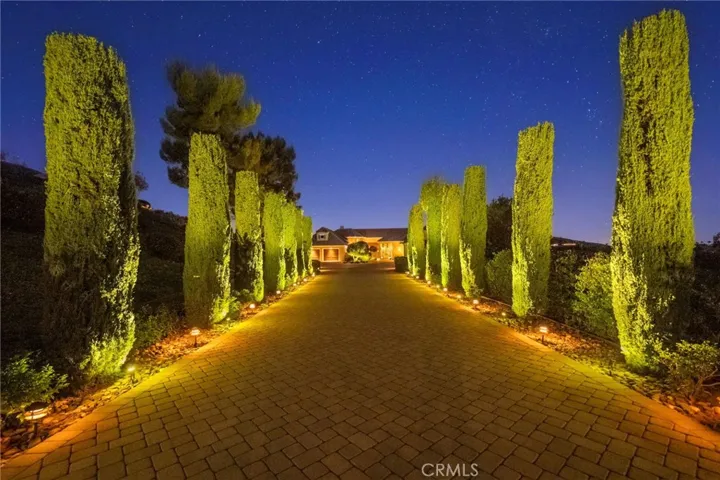 Cypress lined driveway to Main Home